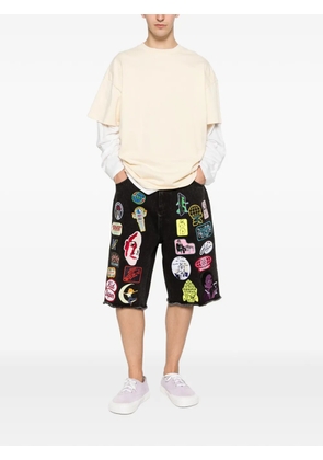 KidSuper patches-appliqué denim shorts - Black