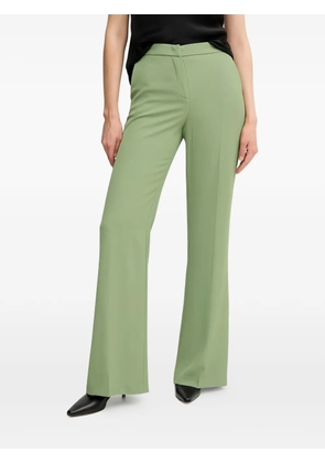 Sandro Ferrone flared trousers - Green