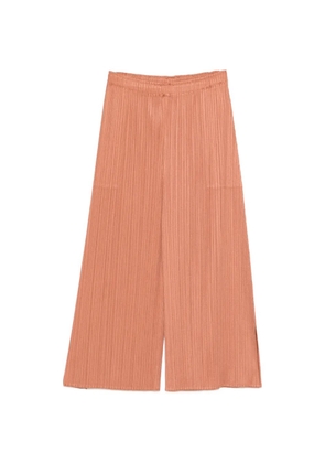Pleats Please Issey Miyake pleated cropped trousers - Brown