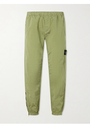 Stone Island - Tapered Crinkled Recycled-Nylon Metal Trousers - Men - Green - UK/US 29