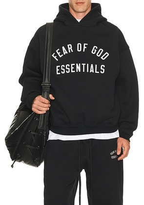 Fear of God ESSENTIALS 90'S Hoodie in Vintage Black - Black. Size L (also in M, S, XL/1X, XS).