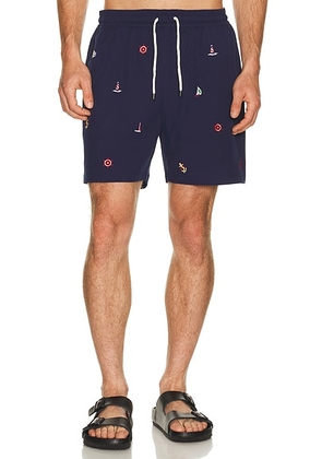 Polo Ralph Lauren Stretch Polyester Boat All Over Traveler Swim Trunk in Newport Navy - Navy. Size L (also in M, S, XL/1X, XXL/2X).