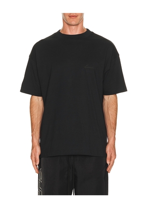 Fear of God ESSENTIALS Classic Short Sleeve Tee in Black. Size L. Also in M, S, XL/1X, XS, XXL/2X.