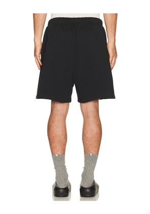 Fear of God ESSENTIALS Classic Short in Vintage Black / Black in Black. Size L. Also in S, M, XL/1X.