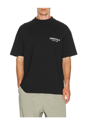 Fear of God ESSENTIALS Classic Fit T-Shirt in Black. Size L. Also in M, S, XL/1X, XS, XXL/2X.