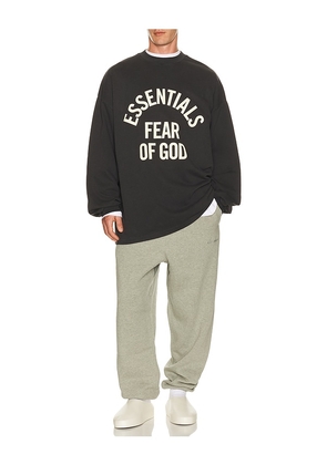 Fear of God ESSENTIALS Campus 90's Long Sleeve Tee in Black. Size L. Also in XS, S, M, XL/1X, XXL/2X, XXXL/3X.