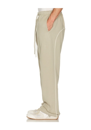 Fear of God ESSENTIALS Active Trace Relaxed Sweatpant in Grey. Size L. Also in XS, S, M, XL/1X, XXL/2X, XXXL/3X.