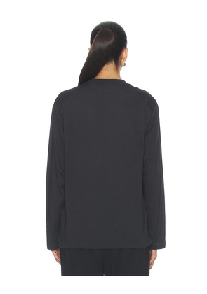 Fear of God ESSENTIALS Signature Classic Long Sleeve Tee in Black. Size L. Also in XS, S, M.