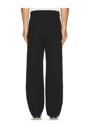Palmes Wide Pleated Suit Trousers in Black. Size 50. Also in 46.