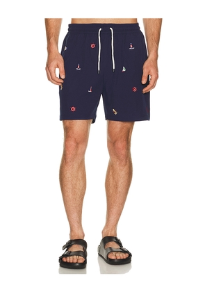Polo Ralph Lauren Stretch Polyester Boat All Over Traveler Swim Trunk in Navy. Size L. Also in M, S, XL/1X, XXL/2X.