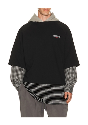 WE11DONE Multi-Layered Hoodie in Black. Size L. Also in M, S, XL/1X.