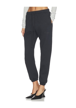 Fear of God ESSENTIALS Vintage Sweatpant in Black. Size XS. Also in S, M, L, XL.