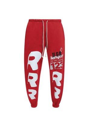 RIVINGTON ROI REBIS Membership USO Enemy graphic-print trousers - Red