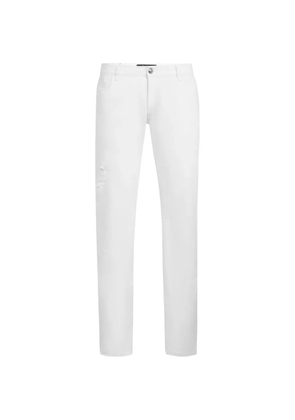Billionaire monogram-stud slim jeans - White