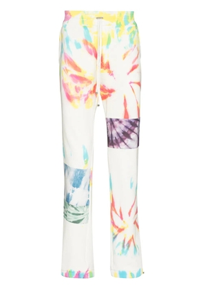 AMIRI tie-dye cotton track pants - White