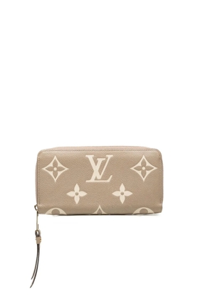 Louis Vuitton Pre-Owned 2021-2026 Bicolor Monogram Empreinte Giant Zippy Wallet long wallets - Brown