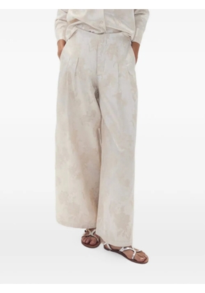LANHTROPY floral-print pleated trousers - Neutrals