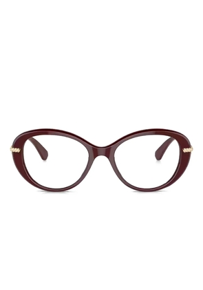 Swarovski Eyewear crystal-embellished oval-frame glasses - Red