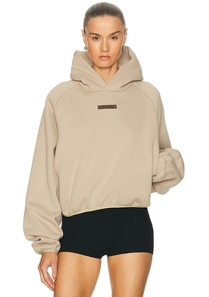 Fear of God ESSENTIALS Fleece Modern Fit Hoodie in Timber - Beige. Size XS (also in S, L).