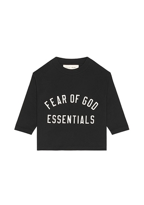 Fear of God ESSENTIALS Kids Classic Long Sleeve Tee in Vintage Black - Black. Size 2/3 (also in 4/5, 6/7).