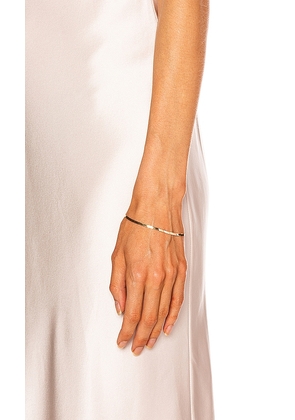Loren Stewart Herringbone Bracelet in Metallic Gold.