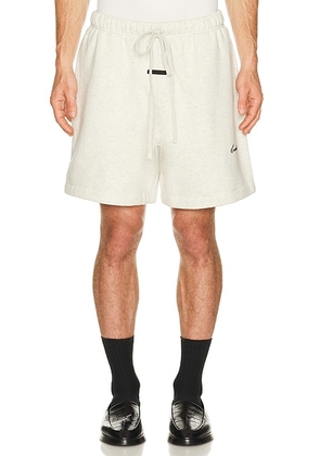 Fear of God ESSENTIALS Classic Short in Oatmeal Heather/Light Heather in Oatmeal Heather & Light Heather - Beige. Size S (also in XS, M, L, XL/1X,...