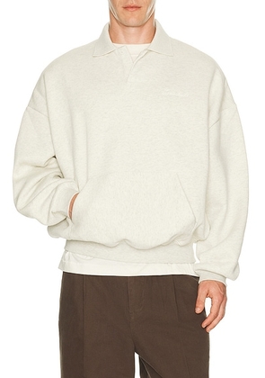 Fear of God ESSENTIALS Signature 90's Polo Sweatshirt in Oatmeal Heather & Light Heather - Light Grey. Size XS (also in S, M, L, XL/1X, XXL/2X,...