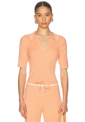 La Porte Odette Knit Polo Top in Coral Reef - Coral. Size XS (also in S, M).