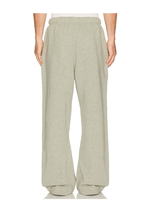 Fear of God ESSENTIALS Signature Flare Sweatpant in Grey. Size XS. Also in S, M, L, XL/1X, XXL/2X, XXXL/3X.
