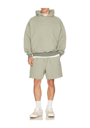 Fear of God ESSENTIALS Signature Classic Hoodie in Grey. Size XS. Also in S, M, L, XL/1X, XXL/2X, XXXL/3X.