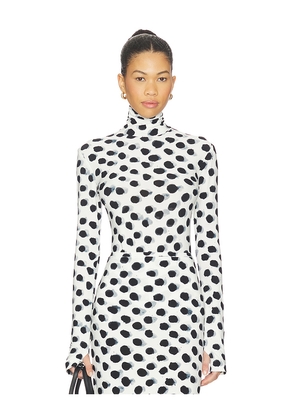 Norma Kamali Slim Fit Long Sleeve Turtleneck Top in Black,White. Size S. Also in XXS, M.