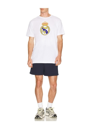Real Madrid Primary Tee in White. Size S. Also in L, M, XL/1X.