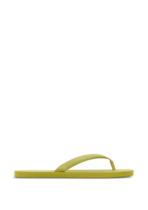 Prada debossed-logo flip flops - Yellow