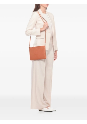 Coccinelle grained leather clutch bag - Orange