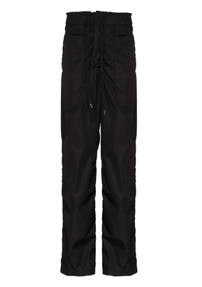 AMBUSH logo-patch track pants - Black