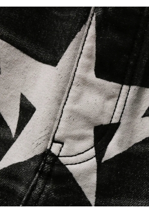 A BATHING APE® distressed star-print jeans - Black