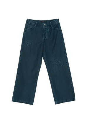 SEWMOD patch-detail garment-dyed jeans - Blue