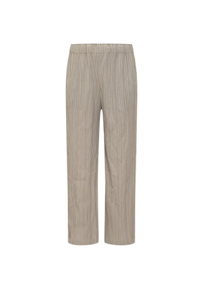 Gongdid Design plissé-effect striped trousers - Neutrals
