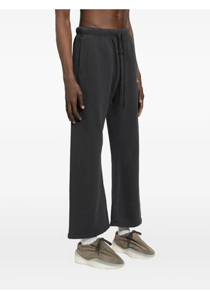 FEAR OF GOD ESSENTIALS faded track pants - Black