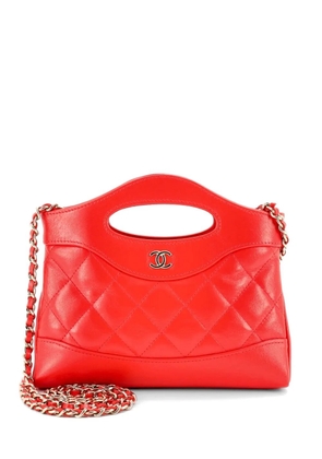 CHANEL Pre-Owned 31 Shopping Bag Clutch with Chain Quilted Lambskin Small crossbody bag - Orange
