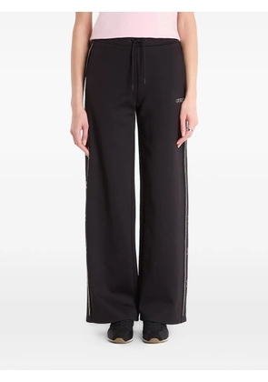 GUESS USA logo-embellished track pants - Black