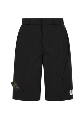 Undercover x Dickies asymmetric-stitch logo-patch shorts - Black