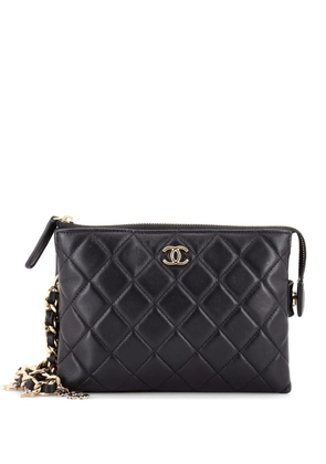 CHANEL Pre-Owned Coco Charms Wristlet Pouch Quilted Lambskin clutch bag - Black