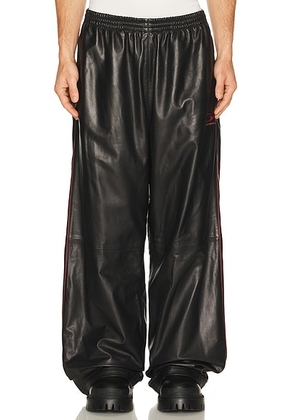 Balenciaga Tracksuit Pants in Black & Burgundy - Black. Size 50 (also in ).