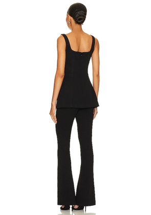 MISHA Belva Jumpsuit in Black. Size M. Also in L.