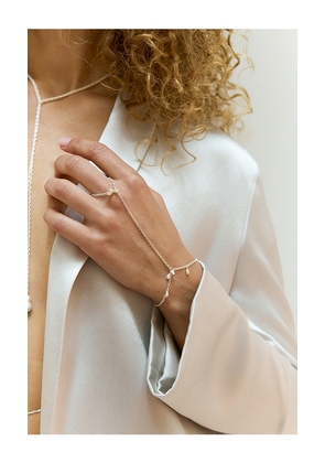 NAiiA x REVOLVE Pearl Shaker Hand Chain in Metallic Gold.