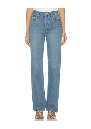RE/DONE 90s High Rise Loose Jean in Blue. Size 23. Also in 24, 25, 26, 27, 28, 29, 30, 32.