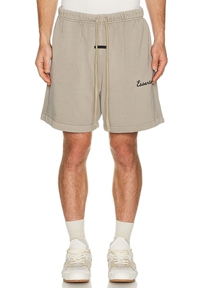Fear of God ESSENTIALS Training Classic Fit Short in Faded Seal - Neutral. Size XS (also in S, M, L, XL/1X, XXL/2X, XXXL/3X).