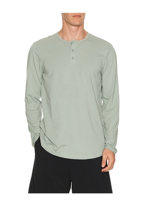Cuts Curve Hem Long Sleeve Henley in Slate. Size L. Also in S, M, XL/1X, XXL/2X.