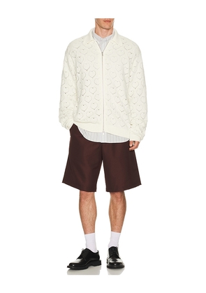 vowels Eyelet Knitted Zip Up in White. Size 1. Also in 2, 4.